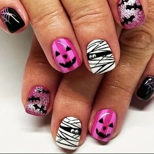 Halloween Nail Art with Pink and Black Designs